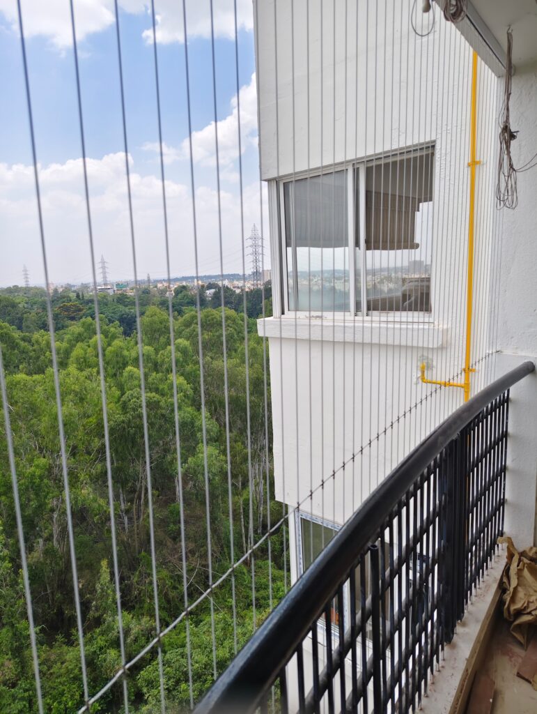 Child-safe invisible balcony grills installed in Koramangala for added home safety